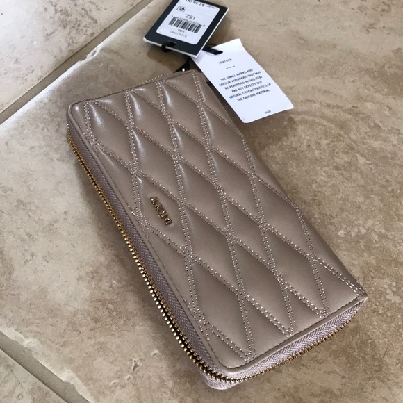 Dkny Handbags - DKNY Quilted leather wallet